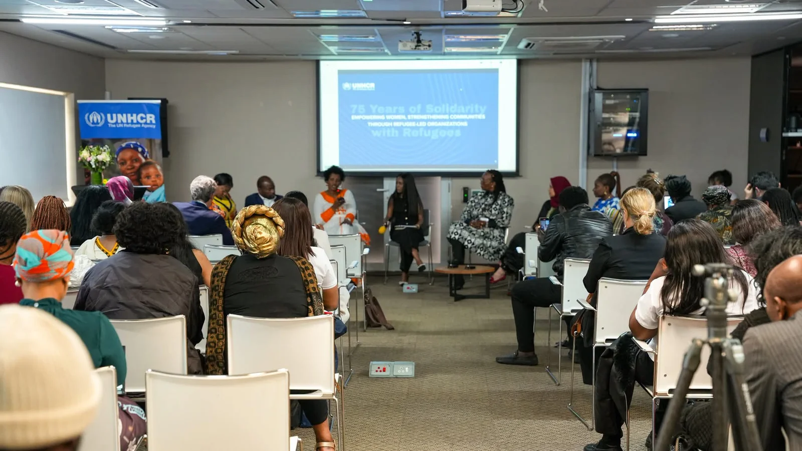 Attendees listen to a panel discussion at the UNHCR and Refugee-Led Organizations event in South Africa.